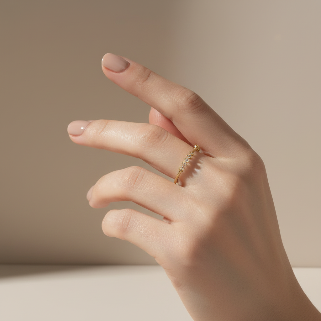 Anillo bolitas en mano
