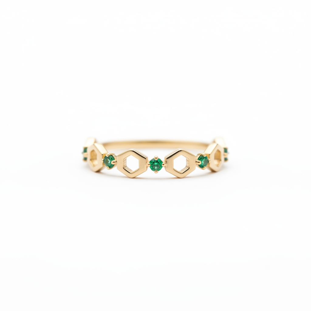 Anillo hexágonos esmeraldas fondo blanco