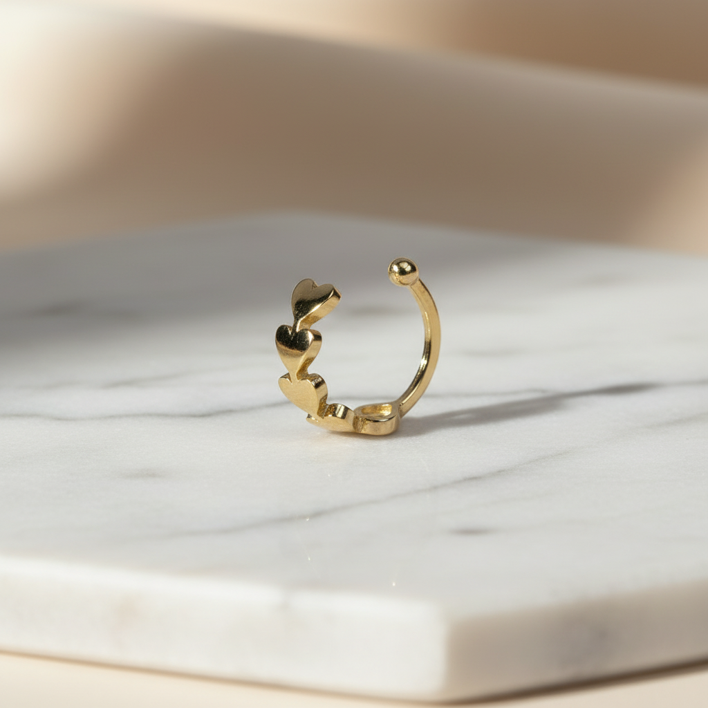 Arete de oro con corazones - Sobre superficie