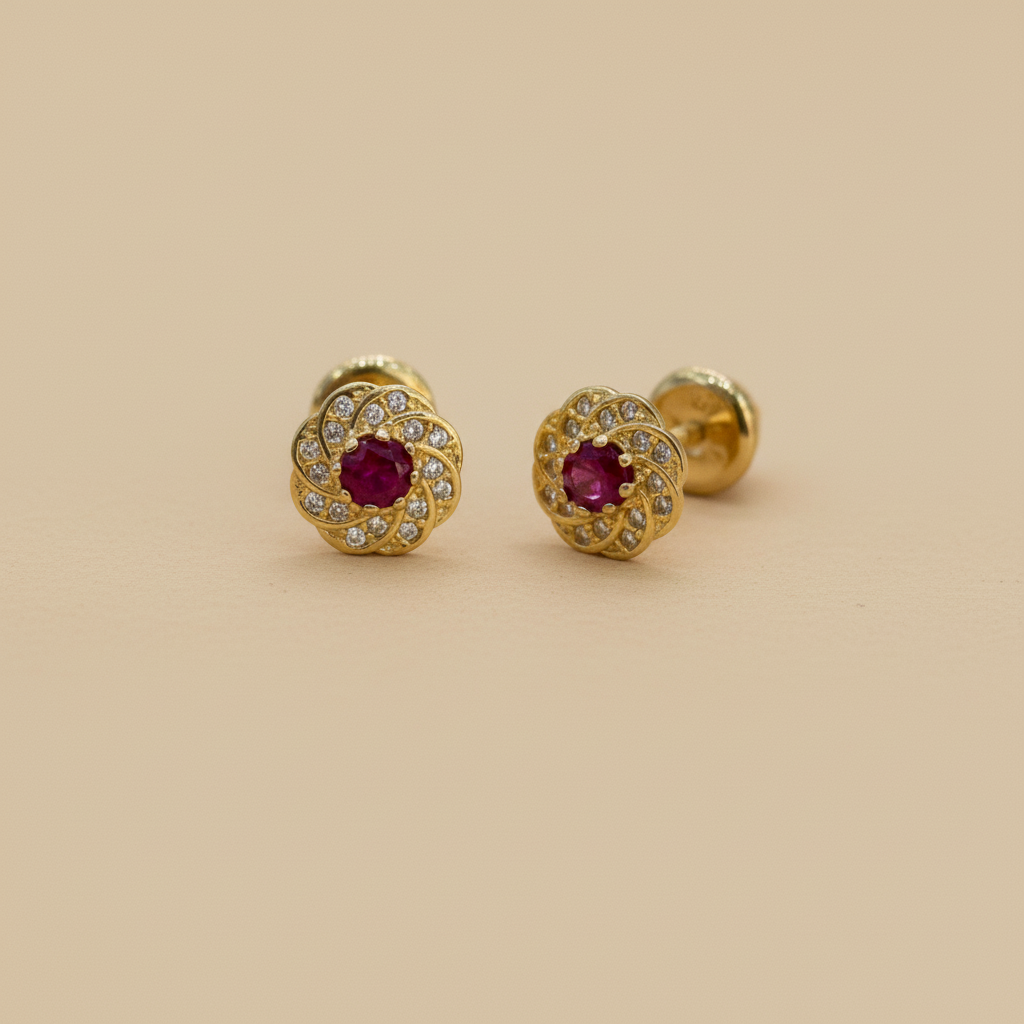 Aretes con rubí fondo beige