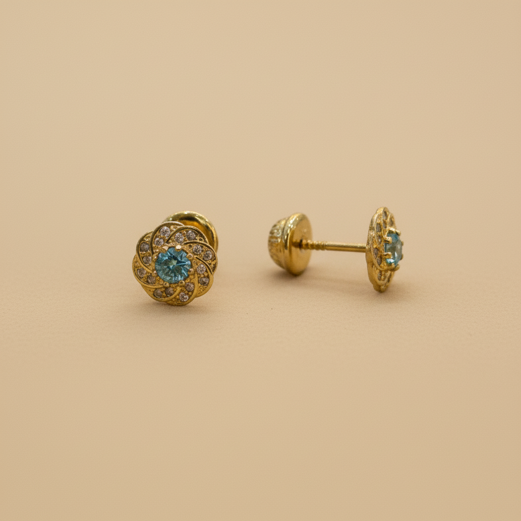 Aretes con topacio azul fondo beige