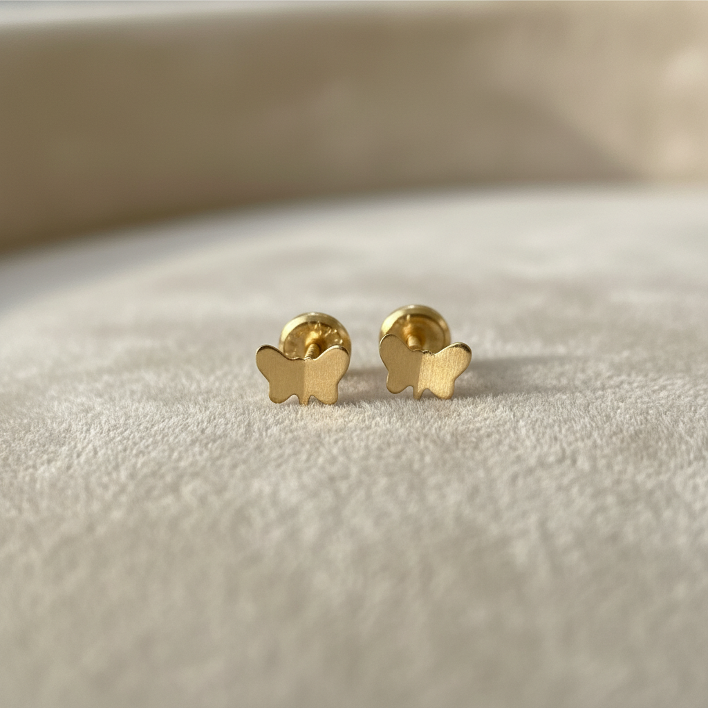 Aretes de mariposa en oro 18k minimalista