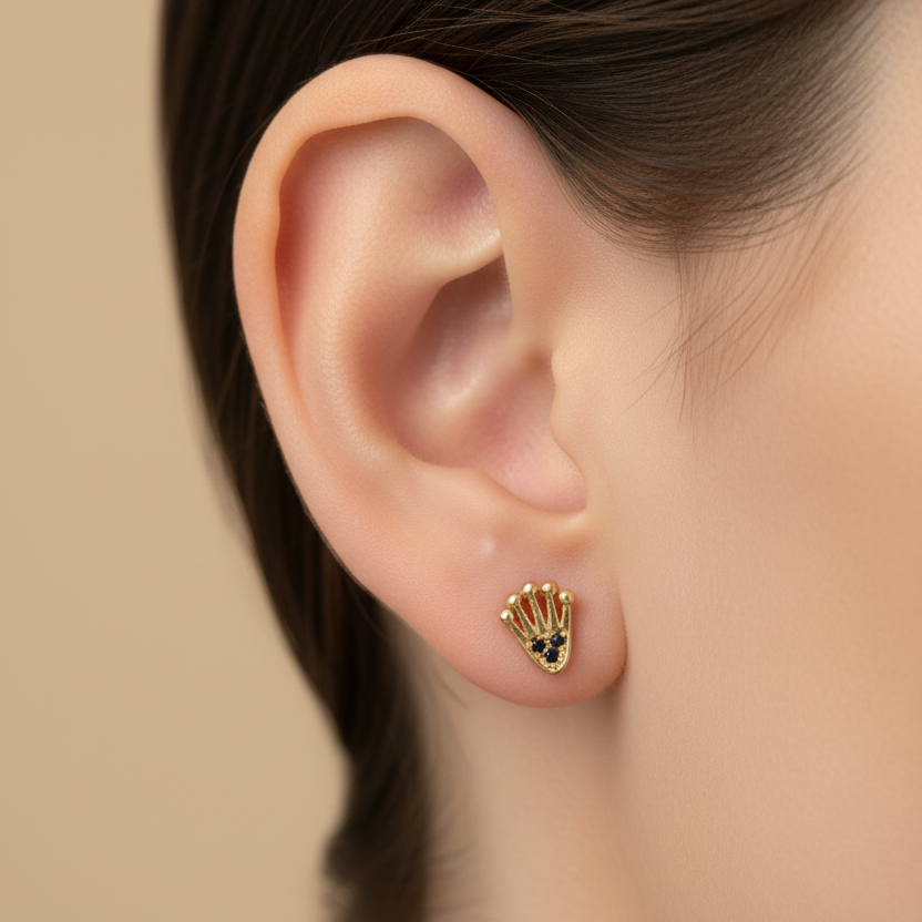 Aretes de oro concha 0.5mm en oreja