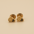 Aretes de oro concha con piedras negras mejorados