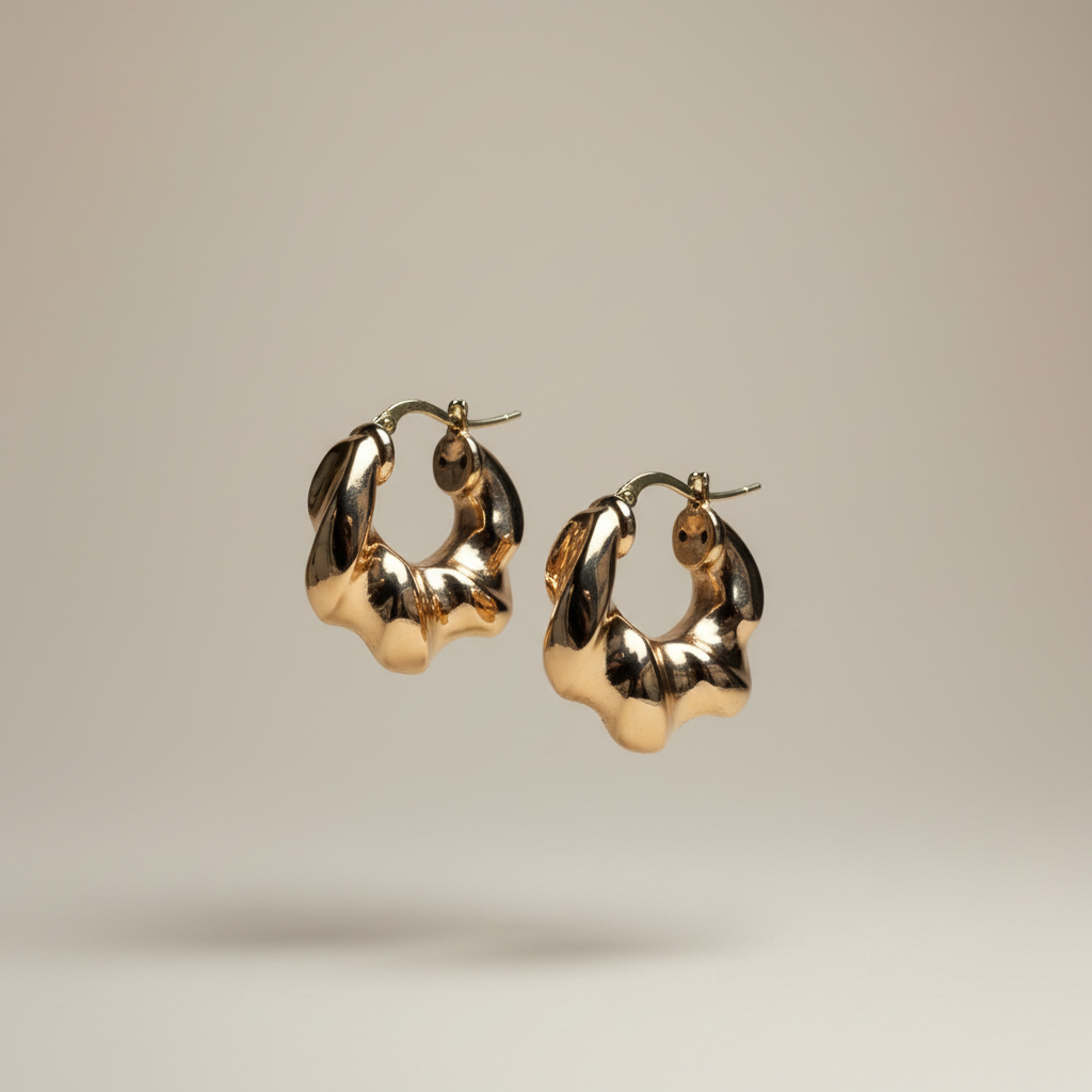 Aretes de oro ondulados - Catálogo profesional