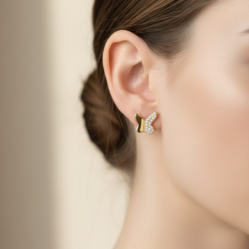 Aretes mariposa oro 18k con circonitas en oreja