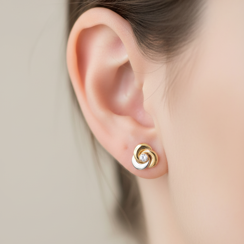 Aretes rosa tres oros en oreja 0.1cm