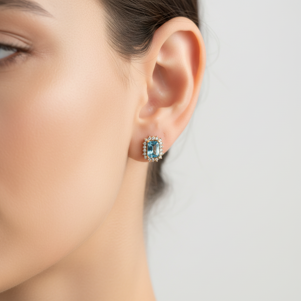 Aretes topacio azul 7mm en oreja - tamaño real