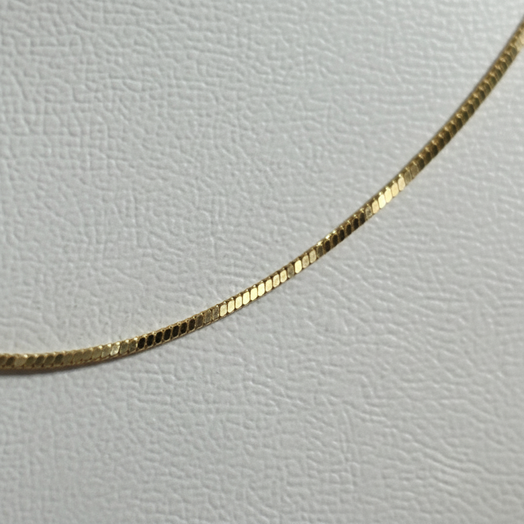 Cadena de oro 18k - detalle macro del tejido