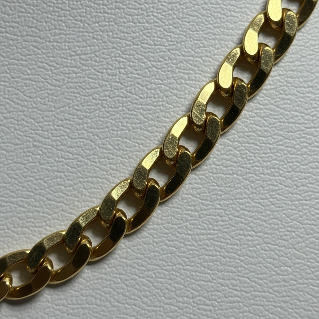 Cadena de oro tipo barbada - detalle macro del tejido