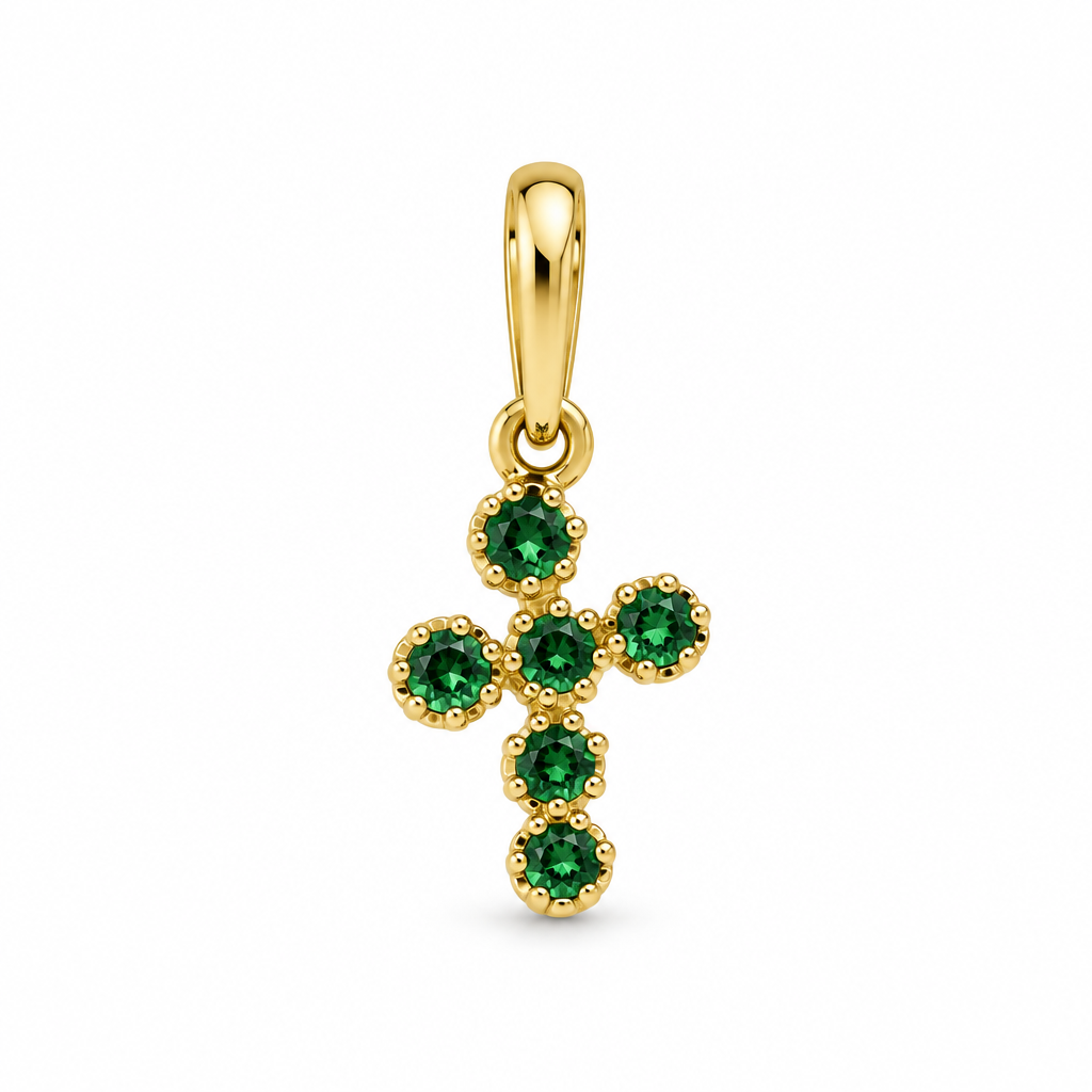 Dije de piedras verdes sobre fondo blanco