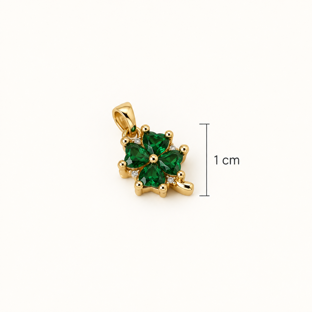 Pieza dorada con piedras verdes y guía de 1 cm