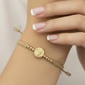 Pulsera tejida Guadalupe with French manicure
