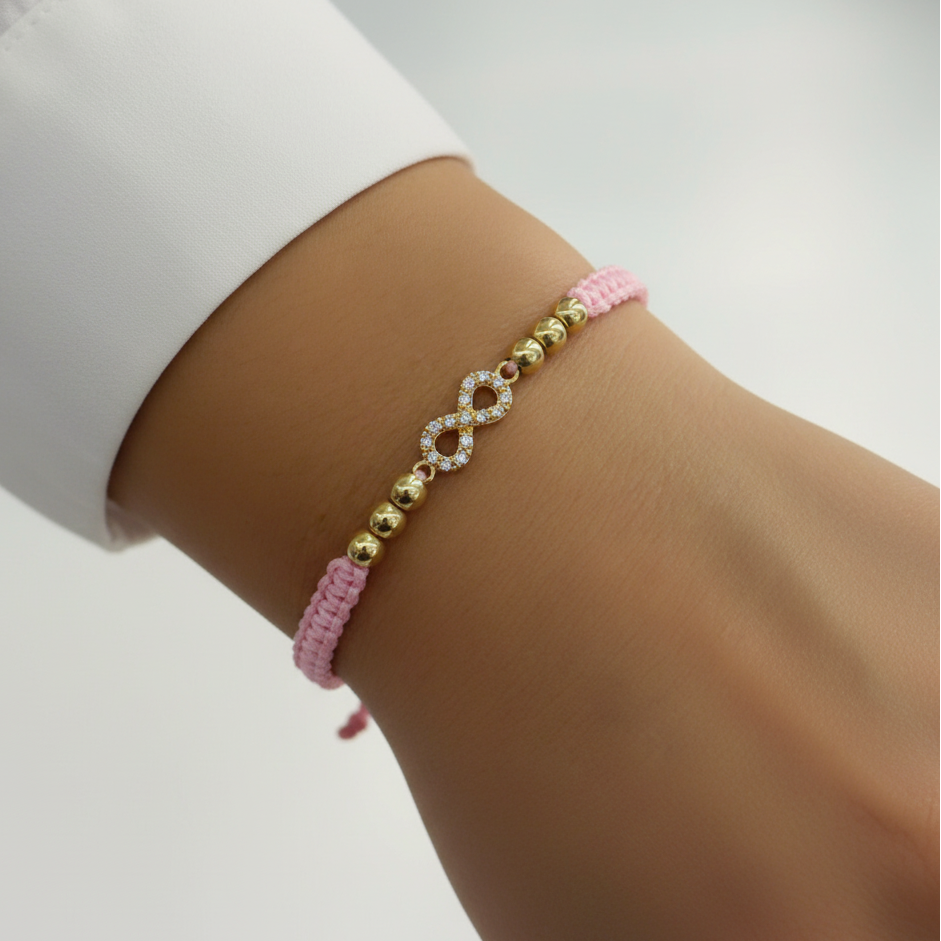 Pulsera tejida infinito en mano - 4 balines