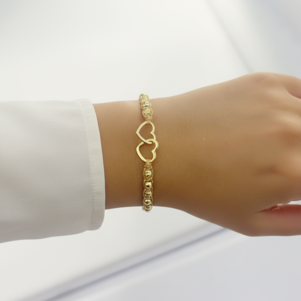 Pulsera tejida somos dos en mano