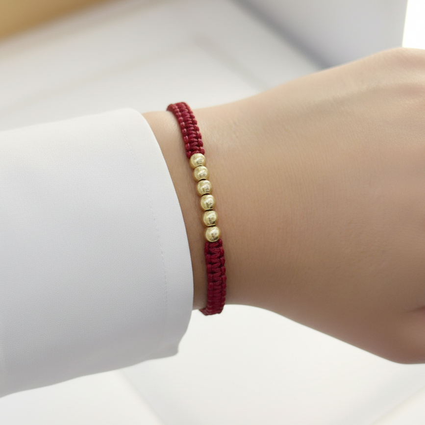 Pulsera tejido glow en mano