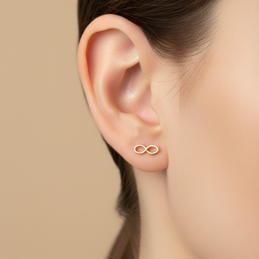 Topitos infinito en oro 0.1cm pequeños en oreja