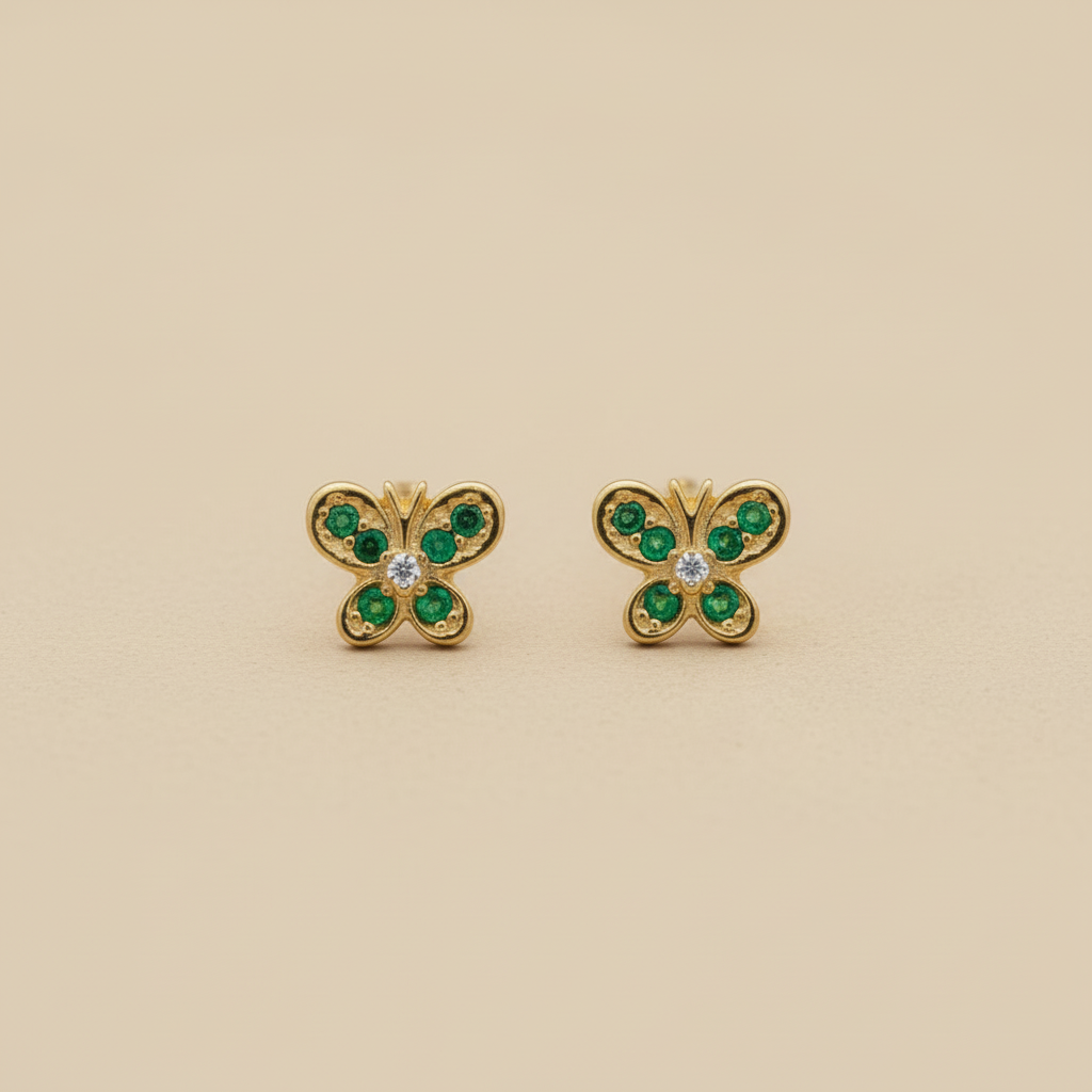 Topitos mariposa en oro con piedras ambos de frente