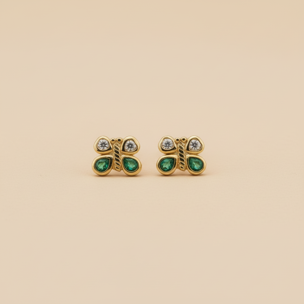 Topitos mariposa en oro con piedras de frente iguales